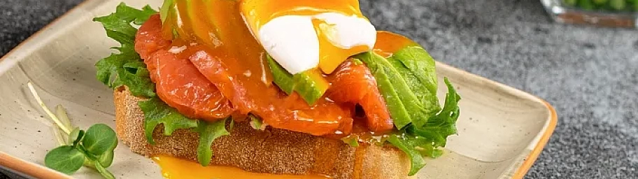 Bruschetta with Poached Egg and Seaberry sauce Tamaki