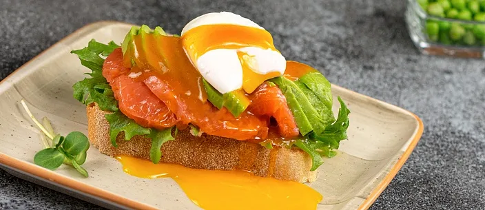 Bruschetta with Poached Egg and Seaberry sauce Tamaki