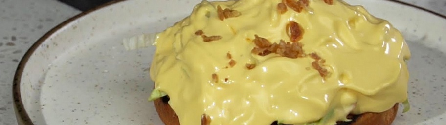 Perfect breakfast recipe: eggs benedict with cheese sauce