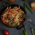Wok with udon noodles and vegetables with Sweet chili sauce Tamaki