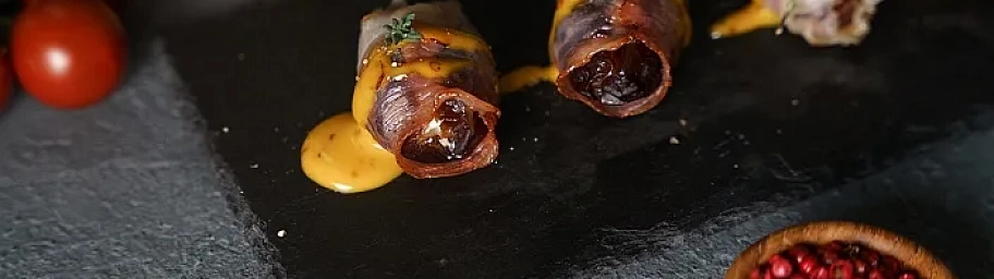 Baked dates with cheese in bacon with Tamaki Honey Mustard Sauce